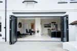 4 part bi folding door set, sprayed in a Grey / Black (Ral 7021 helps deliver the modern and contemporary space that our customer required